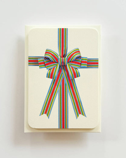 Biglietto di auguri con fiocco a strisce di caramelle